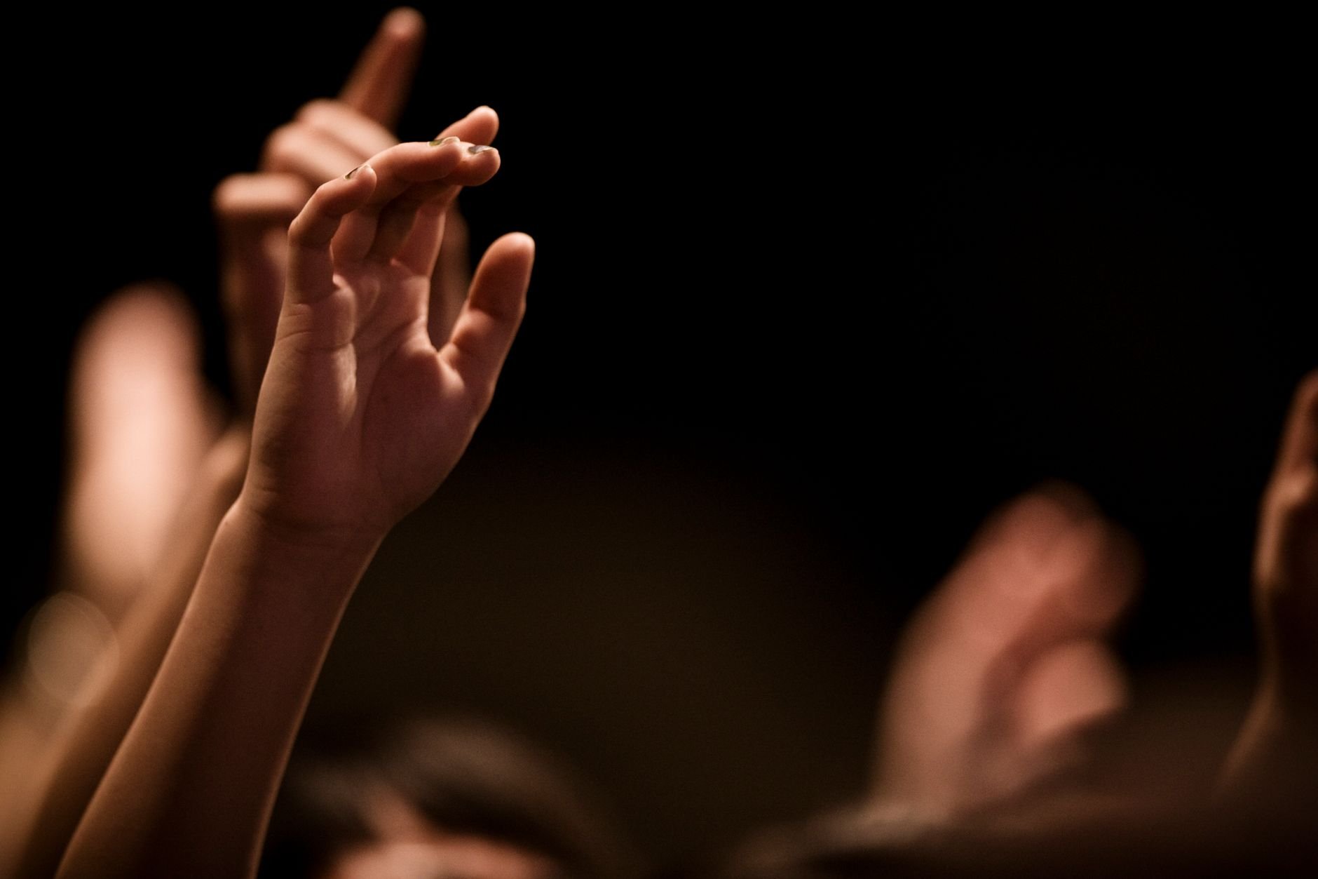 Hands raised in worship