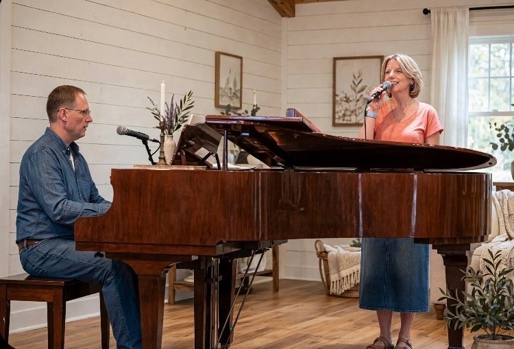 Scott and Tessa Thomas at the piano together